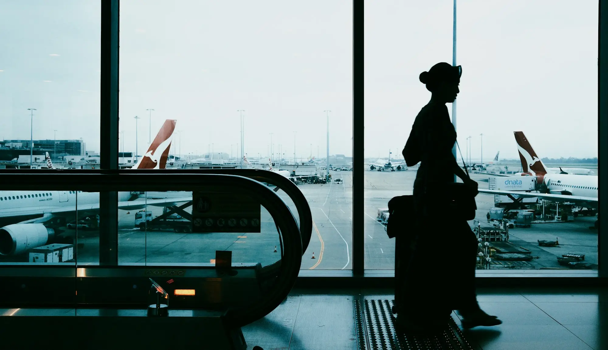 Traveller with a suitcase at the airport